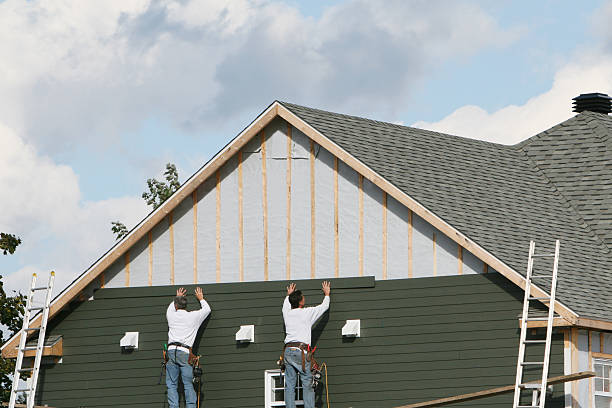 Professional Siding Installation technician working in Petersburg, VA